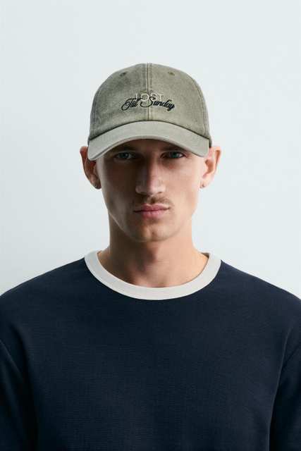 WASHED CAP WITH EMBROIDERED TEXT