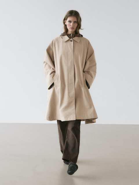 Cape trench coat with hood